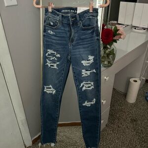 brand new never worn american eagle ripped blue jeans
